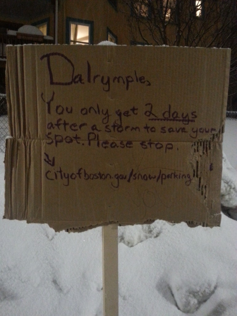 Space saver signs on Dalrymple Street, Feb. 15, 2015.