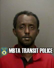 Guled Ali, of Boston, was arrested and charged on outstanding warrants after Transit Police say they saw him evade the fare at Forest Hills Station.