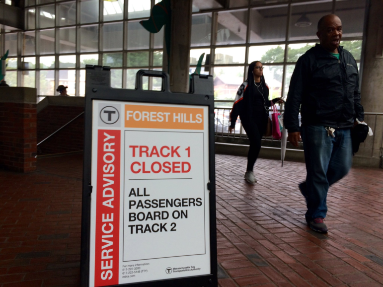 File photo: Commuters will soon see signs like this again, pictured on Sept. 6, 2016, as the T shutters one track at Forest Hills from March 25 through June.